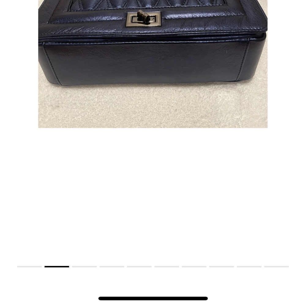 metallic  blue  leather hand bag with adjustable strap 9-16 inches.